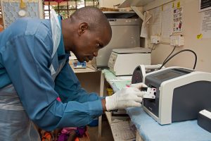 On 10 November 2016 in Malawi, Health Worker Michael Bulla inserts a cartridge, containing a blood sample, into rapid HIV diagnostic equipment at the Ntaja Health Centre, in Machinga District. Early infant diagnosis is integrated into the maternal and child care programme. Every day, about eight women living with HIV travel long distances with their babies to the health centre, for diagnosis, treatment and care. Early diagnosis in the first weeks of life and immediate initiation of treatment is especially critical as HIV advances to AIDS very quickly in infancy. UNICEF is supporting government interventions to improve survival rates for babies in Malawi, including innovative rapid technology to determine childrens HIV status. A project in partnership with UNITAID and the Clinton Health Access Initiative aims to expand access to HIV diagnostics in the country at the point of care.