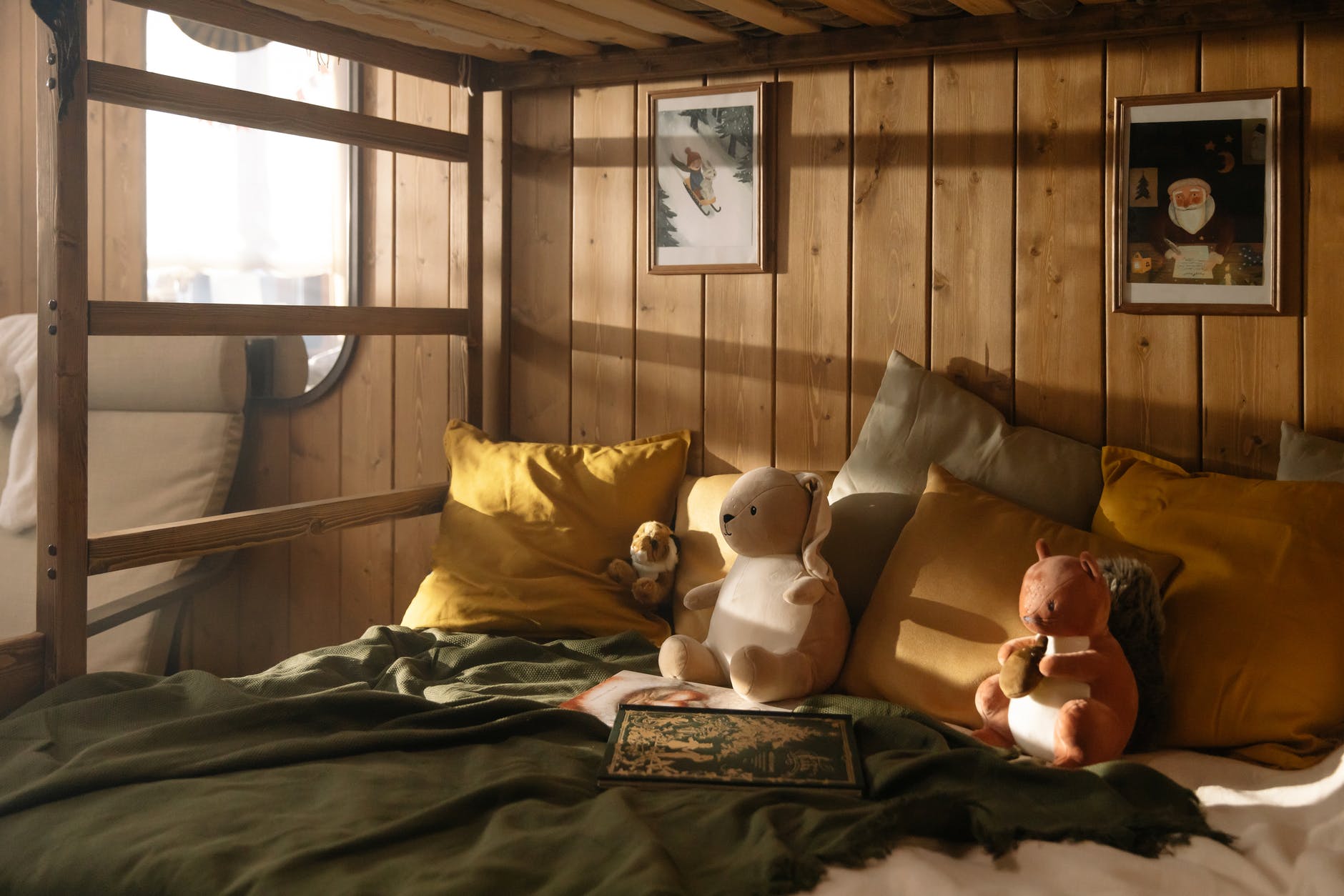 two plush toys on bed