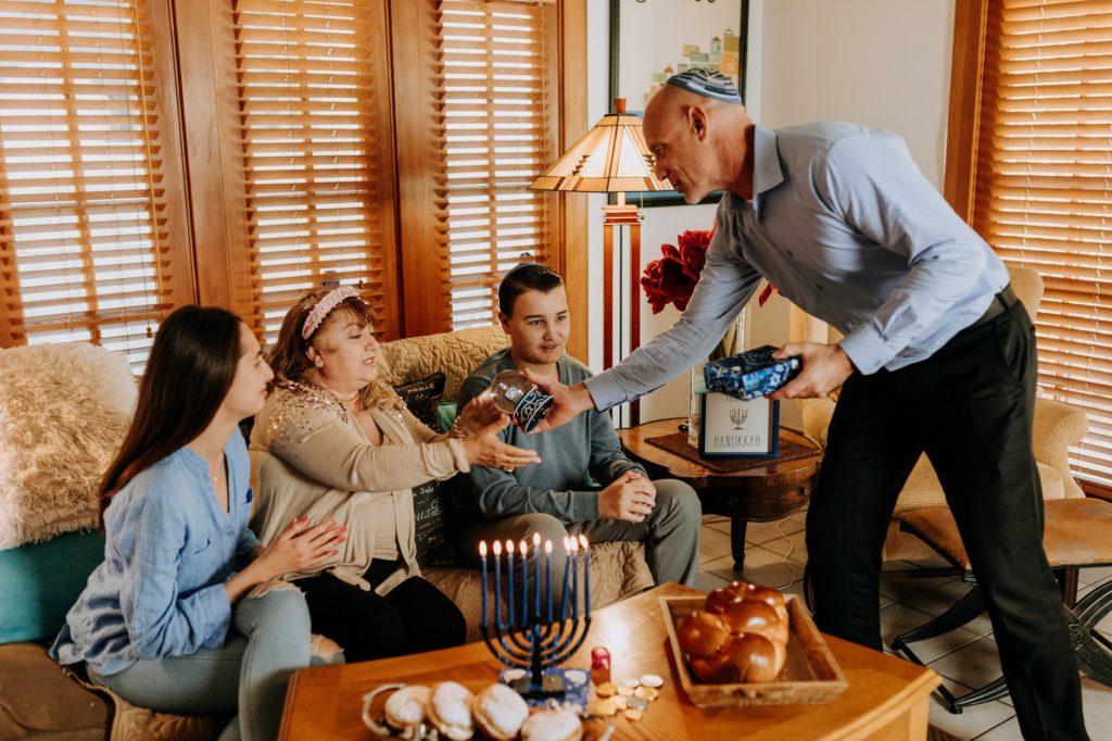 photo of family exchanging gifts